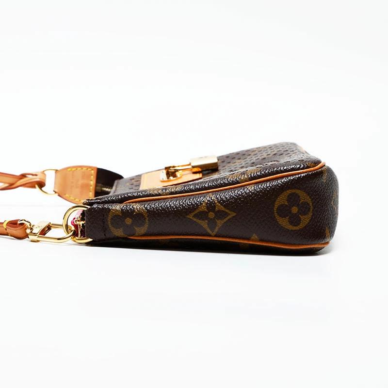 Louis Vuitton Monogram Perforated Pochette Accessoires 2006 Limited Edition Brown Bag – Very Good Condition | BeyVogue