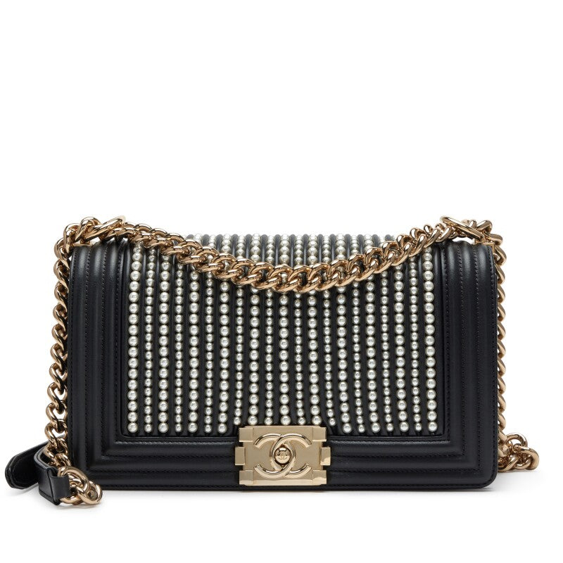 Chanel —  Black Vertical Quilted Calfskin Old Medium Pearl Boy Bag Light Gold Hardware, 2019